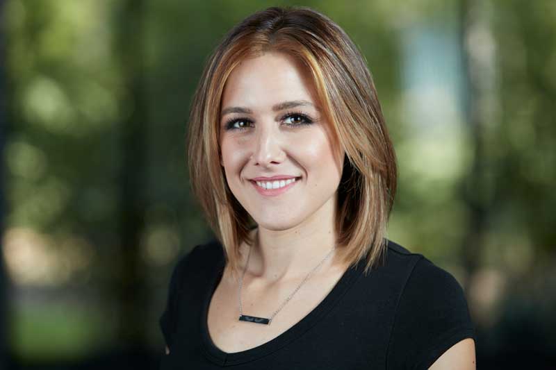 Professional Headshot Houston - Female with green background